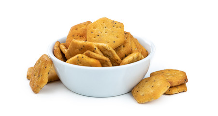 Portion of mixed Snacks isolated on white (close up shot; selective focus)
