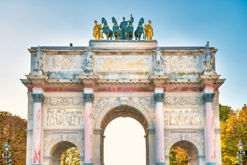 Fototapeta na wymiar Arc de Triomphe at the Place du Carrousel at sunset. Paris, France