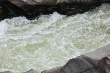Wild River flowing between Rocks