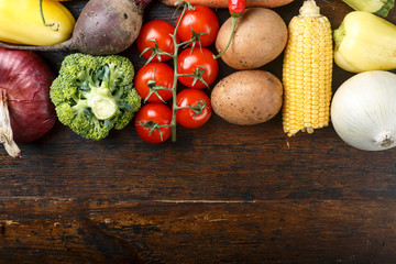 fresh vegetables on wooden background