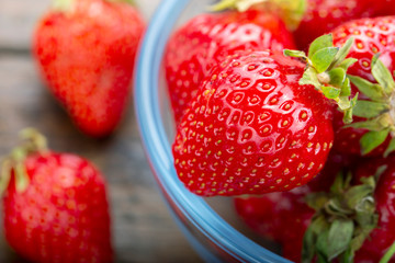farmer strawberries on wooden background