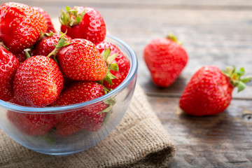 fresh strawberries in a plate on the table
