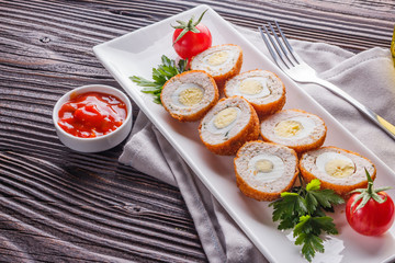 Scotch egg meat balls on rustic wooden background
