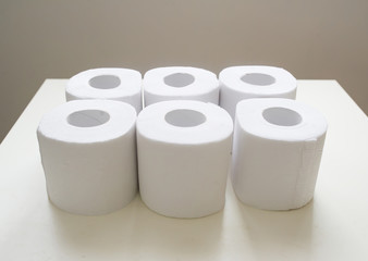 White toilet tissue, paper rolls.