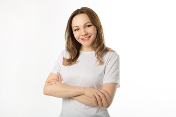 Obraz premium beautiful young woman in a white t-shirt on a white background