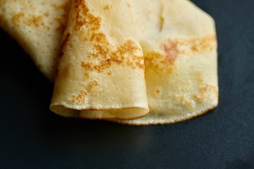 Cheesy, beautiful, delicate pancake closeup. Soft focus and gentle bokeh.