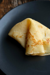 Cheesy, beautiful, delicate pancake closeup. Soft focus and gentle bokeh.