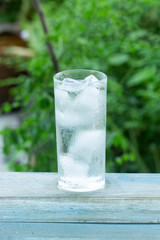 A glass of ice cube with water