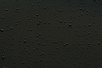 Water droplets on black background.