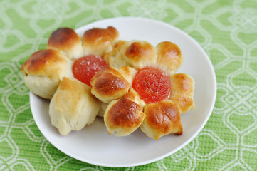 Fresh homemade buns with jam inside. Buns like flowers.