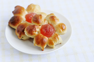 Fresh buns with jam. Buns like flowers.