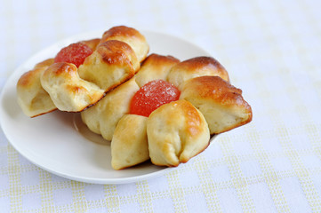 Fresh homemade buns with jam inside. Buns like flowers.