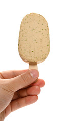 hand holding a fresh seaweed flavor popsicle on white with clipping path