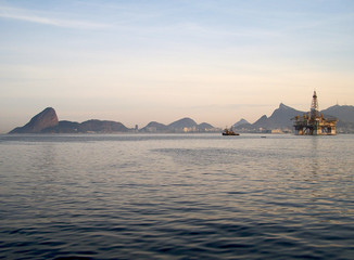 Rio de Janeiro skyline, with Sugar Loaf, Corcovado and an oil platform in the Guanabara Bay.