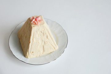 Cottage cheese Easter. Homemade dessert on a white plate.