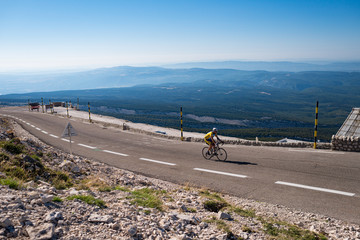 Mt Ventoux, France - August 2013: Cyclist reaches the top of 1900m Mt Ventoux used in the 2013 Tour de France.