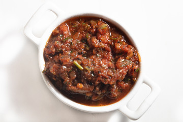 Traditional Turkish appetizer meze - Acili ezme, Chili hot peppers