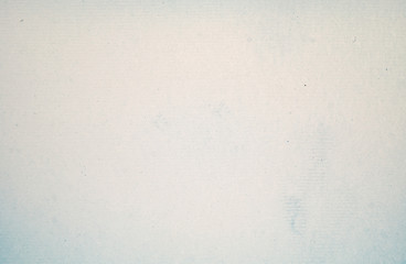 A dense industrial sheet of grey paper with a textured surface
