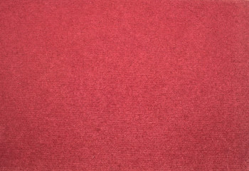 A dense industrial sheet of grey paper with a textured surface