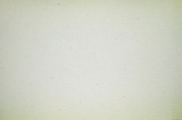 A dense industrial sheet of grey paper with a textured surface