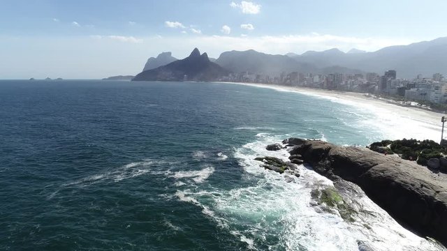 Image of copacabana beach revealing arpoador stone in Rio de Janeiro, Brazil