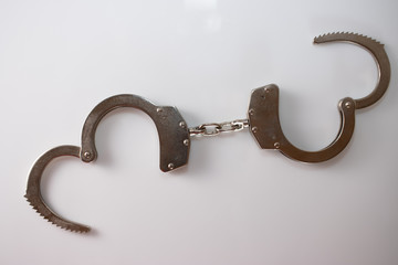 steel metal Handcuffs on  white background isolate