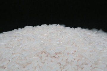 Rice Grains Falling on a pile Macro
