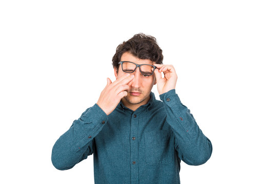 Fatigued Businessman Rubbing His Eyes Can't Focus On Daily Work Due Poor Eyesight, Isolated On White Background. Farsightedness, Myopia Health Problem, Suffering Eye Strain, Sore And Tiredness.