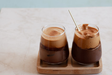 Two glasses with iced coffee drink