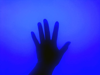 hand in blue
