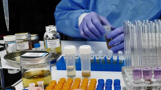 Scientific analysis of wastewater sample in laboratory, investigation of possible contamination by Sars-Cov-2 in humans