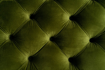 Part of green velvet sofa top view