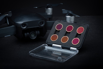 Close up of small case with Neutral Density and polarising filter set for the camera of a...