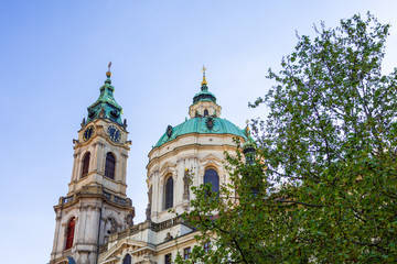 Fototapeta na wymiar St. Nicholas church on Malostranske square in Prague