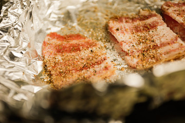 Preparation of billet, balyk with salt and pepper. Foil roasting
