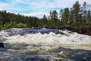 a torrential river in the flaam valley norway