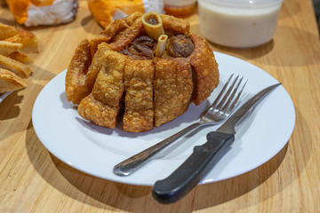 Schweine Haxe or German Pork Hocks on the table in the restaurant.