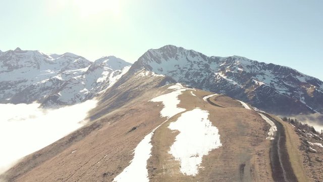 DRONE FOOTAGE - Snow and mountain peaks in the french Pyrenees near the Luchon Superbagn&egrave;res Ski Resort in Saint-Aventin, France. The Luchonnais Mountains aerial view.