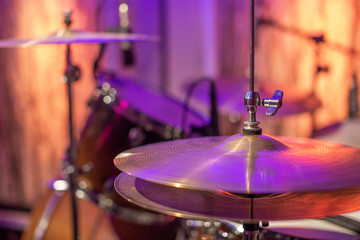 Drums, cymbals, hi hat on a beautiful background in the recording Studio. Room for musicians ' rehearsals. The concept of musical creativity.