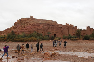 tourists visiting ben al haddou