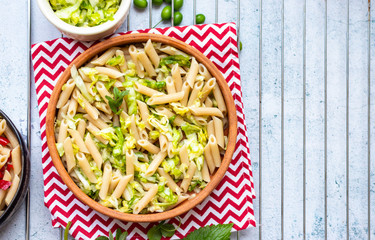 Italian pasta or macaroni with greens and vegetables seasoning. Vegan food