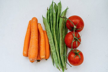 Pile Of Carrots, Tomatoes And Green Beans