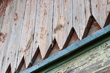 wooden fragment of an old house in perspective from an unusual angle
