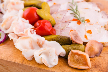Russian traditional snack on a wooden board on a white background