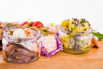 Russian traditional snack on a wooden board on a white background