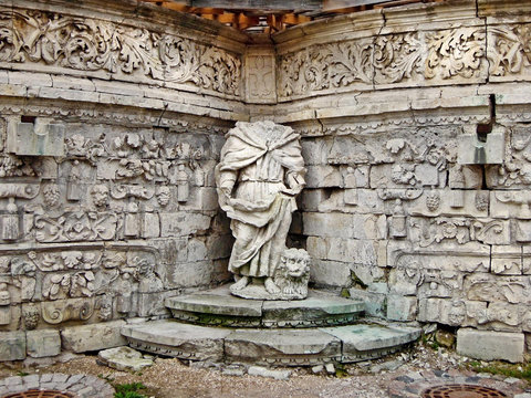 Some of the exterior decorations, headless statue of the saint with the lion in the Church of Our Lady of the Sign, Dubrovitsy (near Moscow), Russia