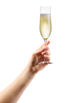 Woman Hand Holding Glass Of Sparkling Champagne Isolated On White.