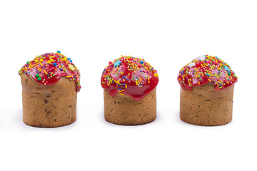 cupcakes with red icing on a white background