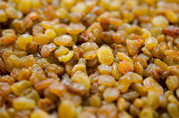 Raisins close up. Dry grapes. Dried fruits for healthy food, dessert substitute