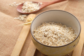  high angle view of oats flakes in a bowl 